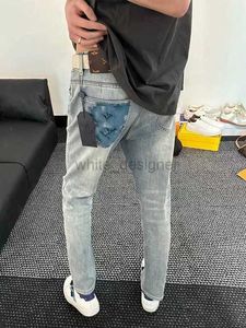 Jeans de grife para homens primavera novo jeans impresso Man Alunos da moda versátil Slim Fit Feet calça com malha vermelha mesmo estilo calça de perna reta de estilo