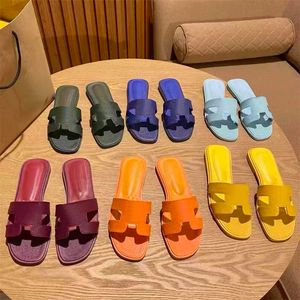 Lyxdesigner Kvinnor Skor tofflor Sommarläder Kvinnor Sandaler Casual tofflor utomhus Kvinnor Flip Flop Brand Ladies Mules Famous Sliders Beach Shoe