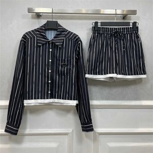 レディースデザイナーの服2ピースセット女性サマーファッションラペルネックボタンストライプシャツトップとハイウエストファッショナブルパンツストリートカジュアルウーマンズ