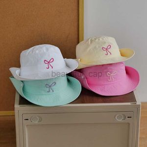 Designer breda grälhattar hink hattar söta rosa båge vindtätt rep snabb torkad fiskare hatt kvinnor sommar utomhus camping bergsklättring hatt skål hatt kepsar