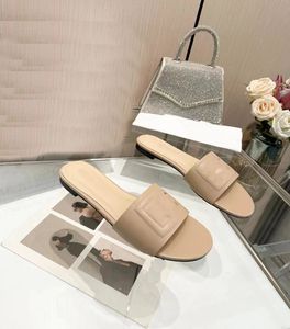 Лучшие D -дизайнер G Сандалии Знаменитые кожаные тапочки с низкой каблукой роскошные женщины Sandale Fashion Women Slides 980980