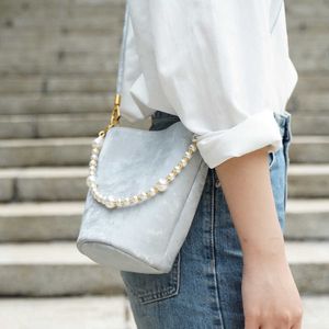 Style Chinese Satin Cowhide Crossbody Bag med en avslappnad och lat populär konsistens Sier Phone Handväska