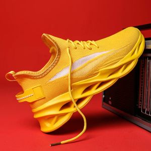 Stivali Nuovi scarpe da corsa calde per uomo unisex Sneaker leggero Donne giallo cuscino sport traspirante per uomo atletico da uomo scarpe da uomo