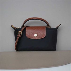 Satış Çanta Gezimi Perakende Toptan Tuvalet Çantaları Cüzdan Lüks Crossbody Fransız Mini Femme Dumpling Bag 2024 Tek Kalıp Deri Çanta Çanta Tasarımcısı