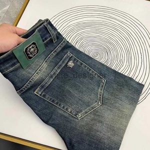 Designer jeans för män våren nya mäns jeans sträcker sig avancerade europeiska raka ben ungdomsstudent medusa långa byxor mode byxor