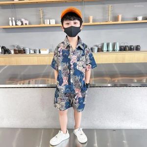 Roupas Defina o verão de adolescentes coreanos camisa fina de meninos finos soltos shorts de peito único 2pcs Casual Manga curta
