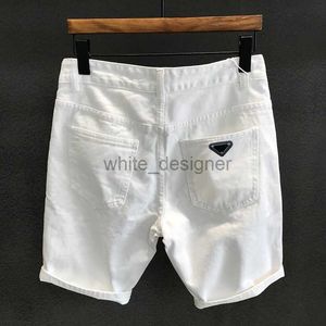 Designer jeans för mens 2024 Nya Kong Trendy White Perforated Denim Shorts Man Leisure Trend Summer Repade tiggare Fashion Pants