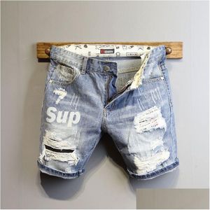 Mäns jeans herrar sommar ljusblå rippad katt whisker brev tryck smal denim shorts tonåringar pojkar och flickor cowboy droppleverans ap dhjy5