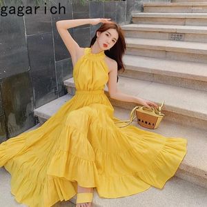 Vestidos casuais gagarich mulheres boêmios verão ocidental amarelo vestido longo longa praia férias sem costas decote de cabre