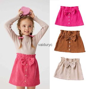 スカートスプリングldren abage baught skirts 0-4yかわいい甘い弓ボタンa-lineスカート秋の女の子ソリッドファッション服H240429