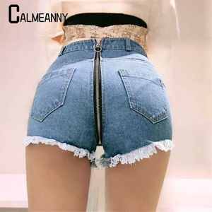 Kvinnors shorts kvinnor jeans shorts 2023 sommar ny koreansk utgåva sexig baksida blixtlås med hög midje hål toassel denim shorts vintage korta hotpants y240425