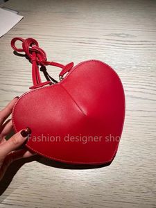TOP Quality 2024 New Red Leather Heart shaped Shoulder Bag Versatile Fashion Peach Heart Bag Crossbody Bag Personalized Bag Trendy Bag Small Crowd Bag Women's Bag
