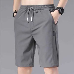 Mäns shorts 2024 Summer Mens Sports Shorts Solid Color Straight Mönster Löst elastisk midja Drawstring Casual Shorts Jogging Shorts J240426