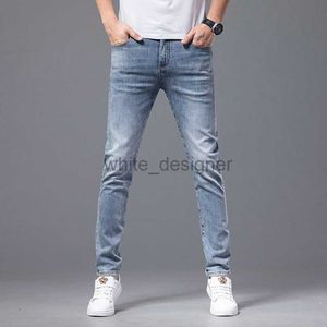 Jeans de grife para homens da primavera masculina de cintura azul de beleza jeans de calça elástica de calça elástica de algodão jeans casuais