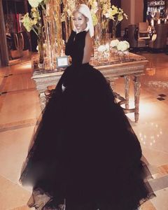 Attractive Open Backless Prom Dress Jewel Neck Long Sleeves Fluffy Floor Length Ball Gown Evening Dress Sexy Black Puffy Tulle Eve4237984