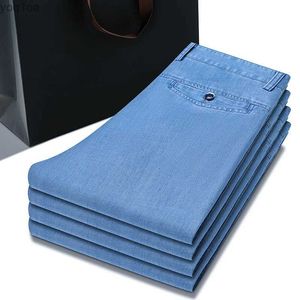 Men's Jeans 2024 Spring/Summer New Mens Thin Light Blue Loose Jeans Commercial Fashion Lyocell Fabric Elastic Denim Trousers Mens Brand PantsL2404