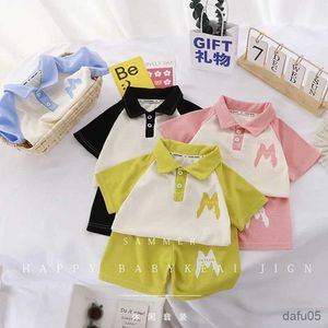 Set di abbigliamento Nuovi abiti da sport per bambini Summer Set da ragazzi Stampa lettere Stampare a maniche corte per polo con polo.