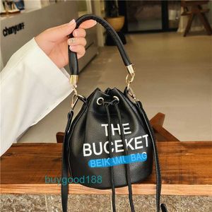 Luxury designer MioZj bucket bag Trendy Letter Bucket Bag Large Capacity for Womens New Fashion Commuter Handheld Versatile One Shoulder Crossbody