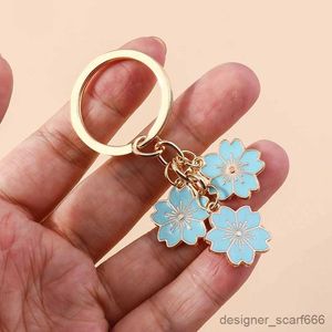 Nyckelringar Lanyards Söt växt Keychain Sakura Flower Key Ring Emalj Key Chains For Women Girls Handbag Pendants Car Key Chains Diy Accessories