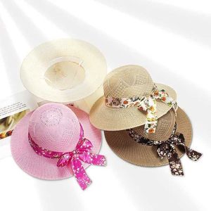 Geniş Memlu Şapkalar Kova Şapkaları Geniş Brim Imitation Str güneş şapkası Uzun çiçek şeridi ve yay örgüsü ile kadınlar için uygun yaz açık seyahat plaj şapkası Panama CS J240425