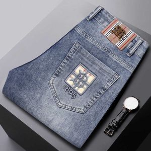 Designer Jeans Mens Autumn New Jeans Men's Classic Blue Letter Brodery Small Straight Fit Elastic Casual Mångsidig Mid midja modemärke Jeans