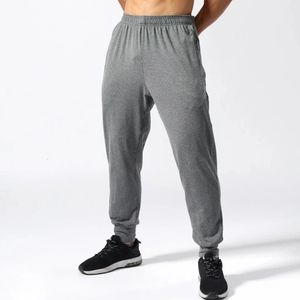 Uomini che corrono pantaloni sportivi fitness da uomo palestra calcio calcio allenamento riflettente jogging pantaloni lunghi pantaloni sportivi 240412