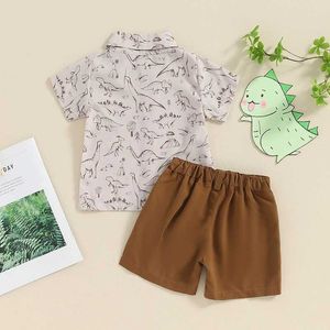 Roupas conjuntos de 1 a 4 anos de menino verão 2 peças configuradas de manga curta Botão de impressão de dinossauros para baixo + calça elástica de cintura infantil roupas infantis