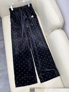 女性用パンツ2024秋/冬のデザインベルベットダイヤモンドワイドレッグファッショナブルでスリムな汎用性の高いパンツ