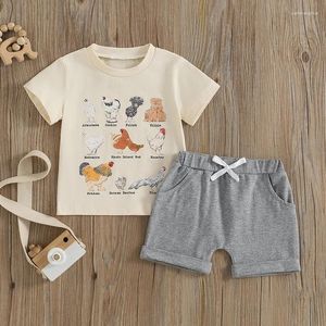 衣料品セットファッション夏の幼児の子供の男の子服漫画のひよこプリント半袖Tシャツポケットショーツホリデービーチの衣装