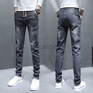 Jeans masculinos Primavera e outono Novo Jeans Men's Jeans Elastic Elastic Small Barrel reto Cinzenta Cantura elástica Jeans masculina Calças de tamanho