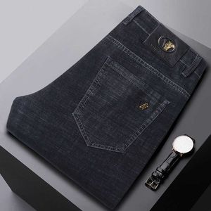 Mäns jeans designer jeans män löst montering rak ben mångsidig trend affärs medelålders tunna mäns avslappnade mäns byxor avancerade
