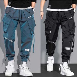 Męskie spodnie męskie spodnie ładunkowe moda hip hop multi kieszeni spodnie mody uliczne odzież solidne sporne spodnie jogging męskie bawełniane spodnie 2404