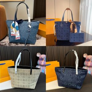 24SS Women's Luxury Designer Vintage Denim Tote Leather Shopping Bag Women's Tote Axel väska shoppingväska Makeup väska Purse Onam