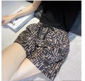 새로운 여성 패션 패션 여름 탄력있는 허리 온통 로고 프린트 느슨한 반바지 smlxl
