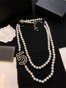 Colares de pingentes de pérolas femininas Chanells Autumn e Winter Pearl Sweater Chain Gold Gardand Cheker Long Woman Jewelry Designer Top Quality Luxury CCLIES 4555