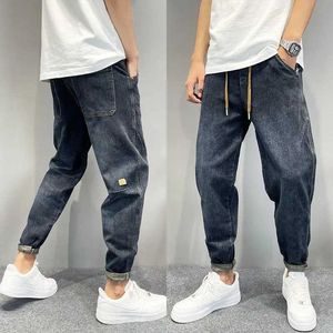 Jeans masculino masculino casual de jeans vintage lavado com ajuste solto cônjuge calças de cenoura outono de streetwear bordado bordado harém q240427