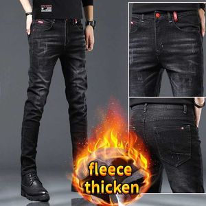 Jeans da uomo pantaloni di lana calda da uomo invernale inverno fodera calda hot fodera nera coreano alla moda ultra-sottile stivali di peluche spessi jeans q240427