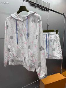 Dwuczęściowe spodnie damskie niebiesko -białe nadrukowane Słońca Suituły Odłączana koszula z małymi szortami stylowym dresem 02