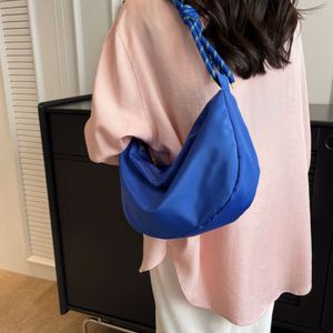 New Vintage Nylon Shoulder Bag: Stylish and versatile for fashion-forward women. Shop now for casual elegance!