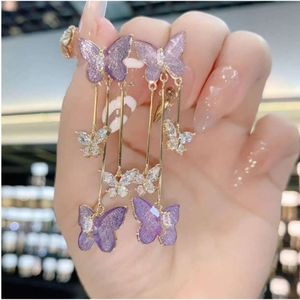 Stud S925 Srebrna igła fioletowe kryształowe kolczyki motylowe dla kobiet zaawansowany lekki luksusowy temperament prosty i długi styl modne kolczyki