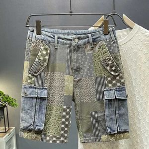 Mäns shorts 2024 Sommar Nya denimshorts för herrens avslappnade löst montering Rak trendigt cashewtryck Flower Work Fem minuters byxor Q240427