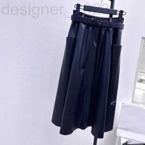Skirts Designer Comes with a waistband triangle logo medium length large swing leather skirt versatile for women fashionable and slimming high waisted skirt spring