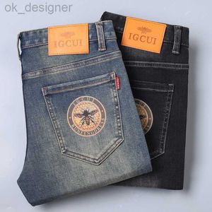 Mäns jeans designer helt nya höga jeans för män elastiska färg tryckt smala passform små raka casual jeans för män