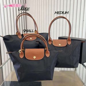 Najlepsze designerskie damskie ramię w stylu europejskim worka w torbie nylonowa torebka crossbody haft haftowe zakupy mini 90 ping