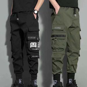 Men's Pants New hip-hop jogger cargo pants mens harem pants casual multi pocket mens black and green sports pantsL2404