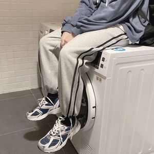 Instagram hip-hop casual byxor för mäns vår/sommarsportkoreansk version Trendiga gata leggings lös raka benbyxor