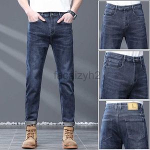 Mäns jeans vår och hösten nymäns jeans utgåva ungdom smal passar elastisk djupblå liten rak mäns jeans plus storlek byxor