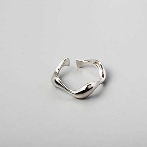 Wedding Rings A minimalist design with irregular wavy patterns and a smooth surface for womens rings. Open silver ring for womens fashion