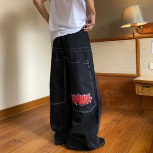 Modne haftowane dżinsy z wysokim poziomem dla męskich hiphopowych amerykańskich dużych luźnych spodni