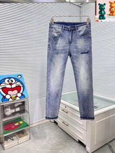 Minimalistische Europa und Amerika Brandbriefmuster hohe taillierte Skinny Jeans Trendy Youth Mans Streetwear Wäschehosen Jeanshosen Hose